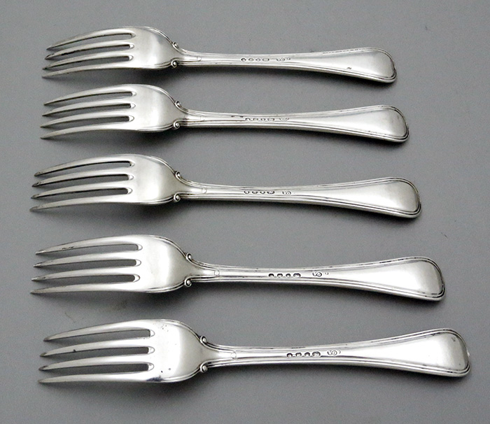 reverse of five dessert forks by George Adams with engraved crests London 1846