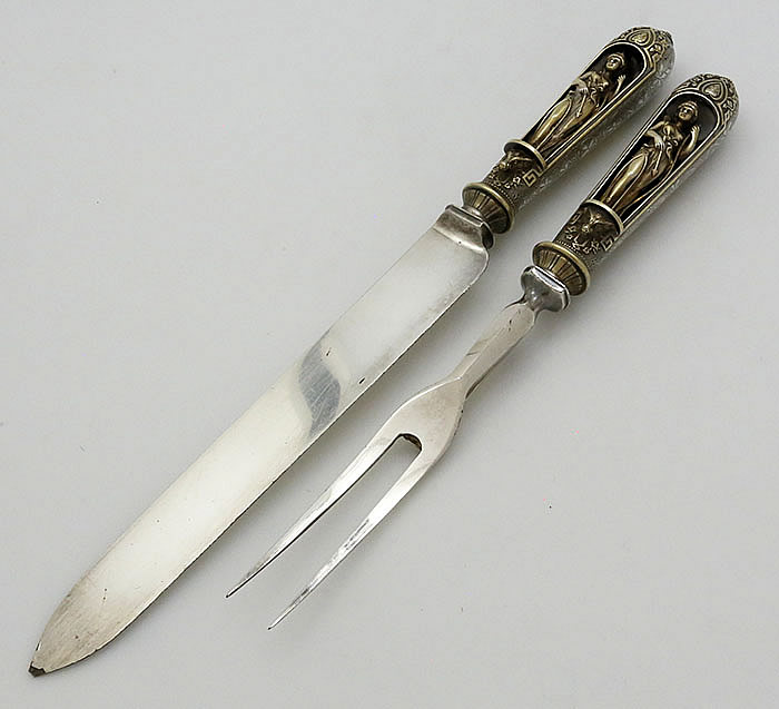 Continental silver carving set with figural handle