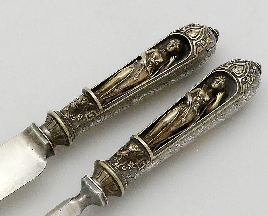 figural handle of carving set