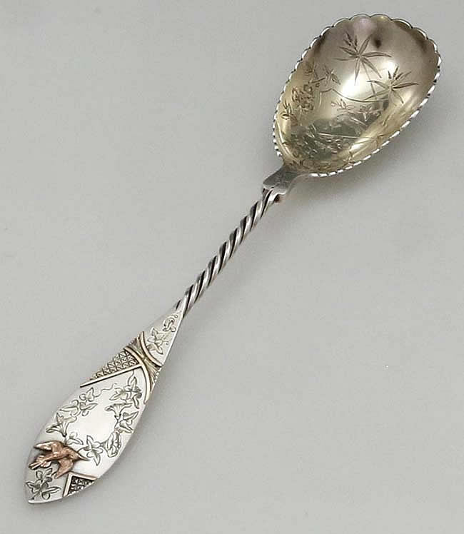 Engnlish antique sterling silver spoon by Frederick Elkington in the aesthetic style with applied mixed metals