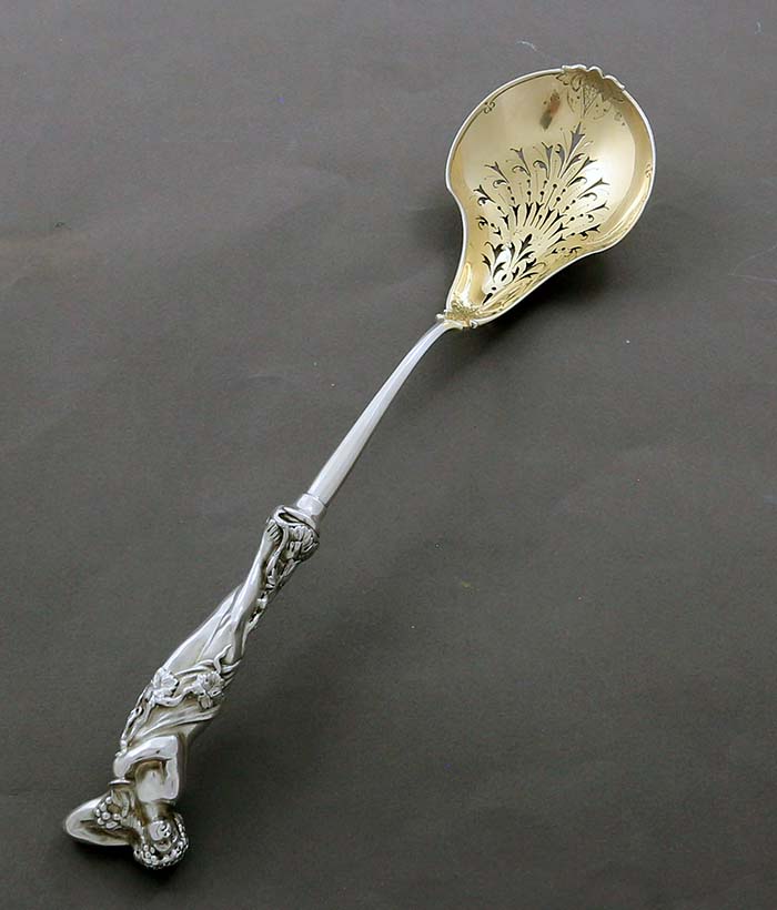 Caldwell antique Sterling pierced spoon with neo classical figurine handle