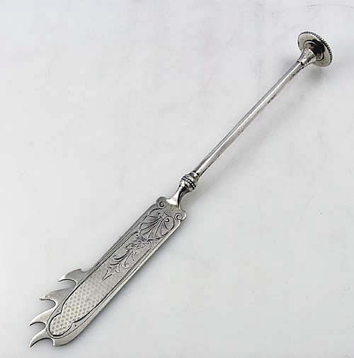 antique silver cheese knife with teeth