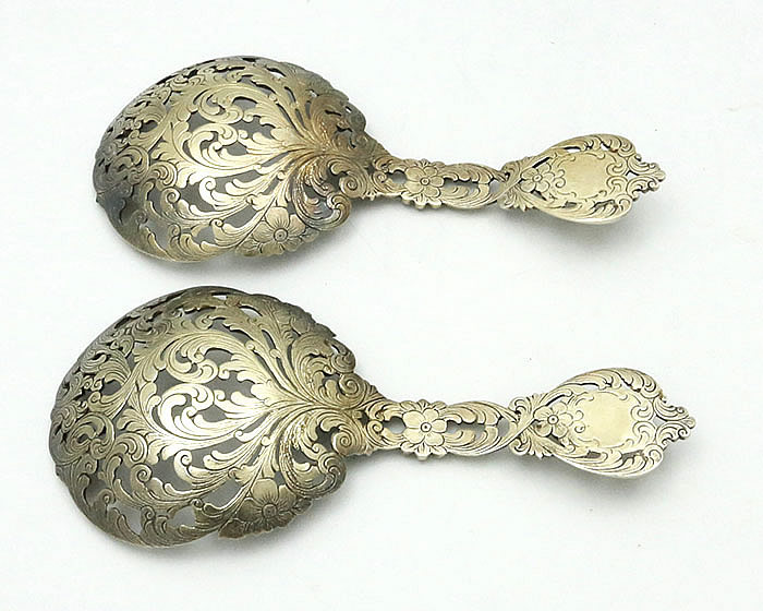 Pair antique American sterling cast bon bon serving spoons