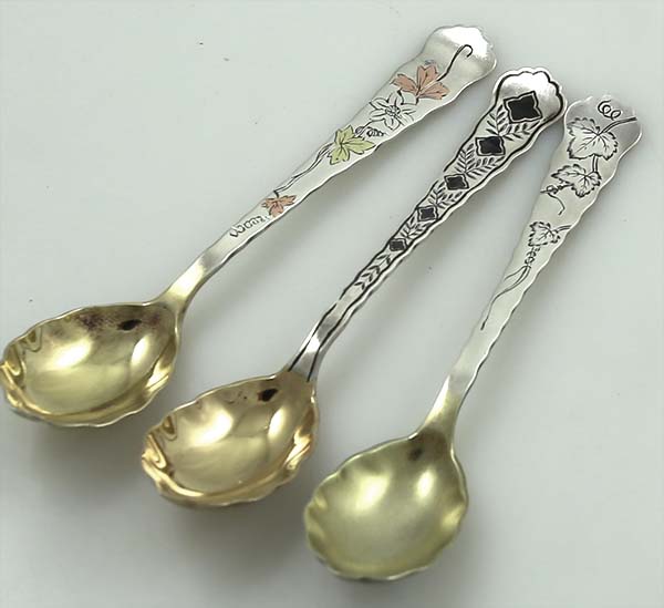 Tiffany antique coffee spoons with silver gilt and multiple metals application circa 1880