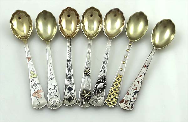 Tiffany antique coffee spoons with silver gilt and multiple metals application circa 1880