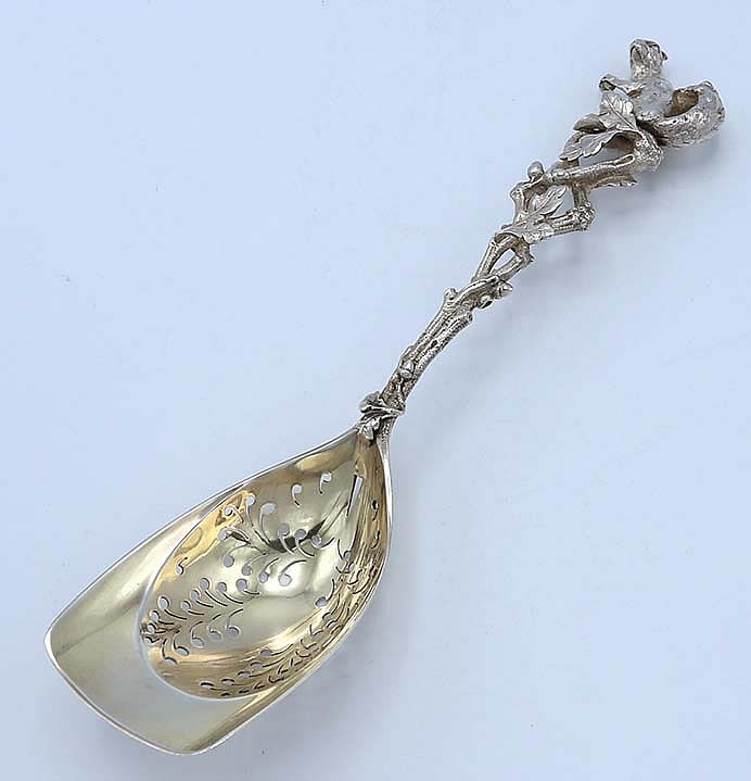 Large Tiffany cast sterling spoon with squirrel terminal and pierced bowl