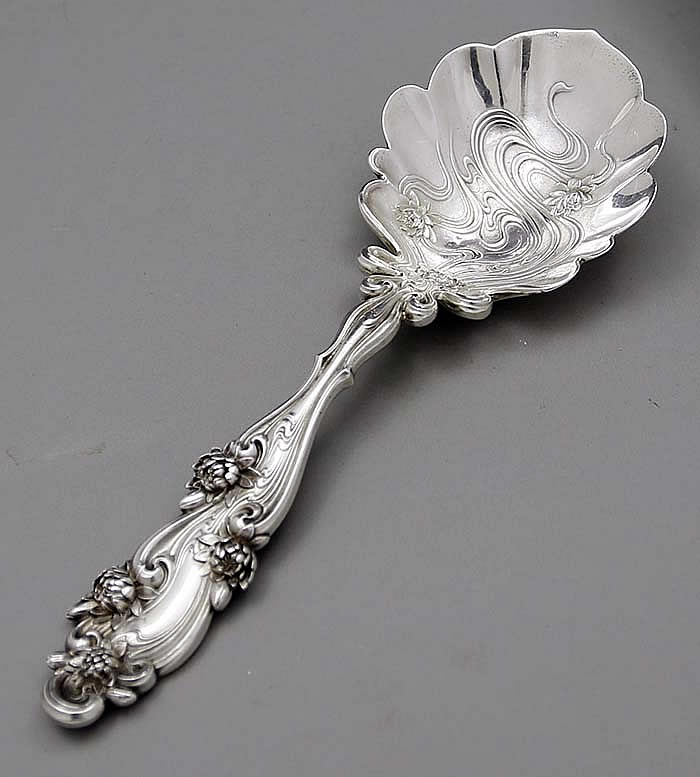 heavy cast antique sterling spoon with water lilies by Whiting