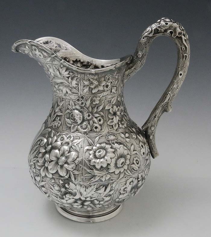 antique sterling silver pitcher