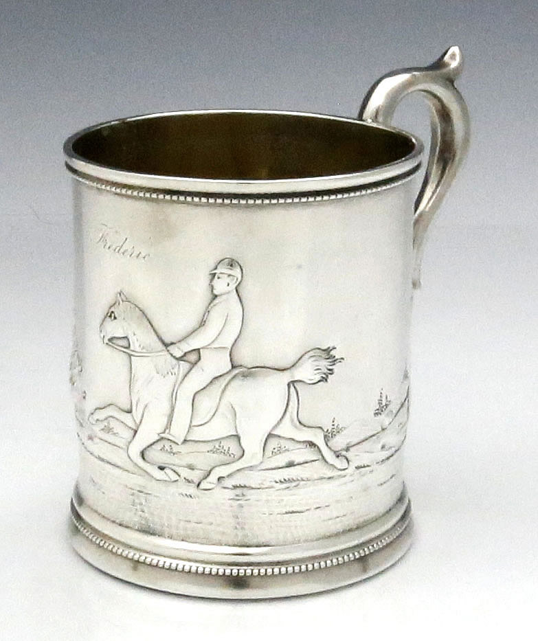 antique silver coin cup with man on horse