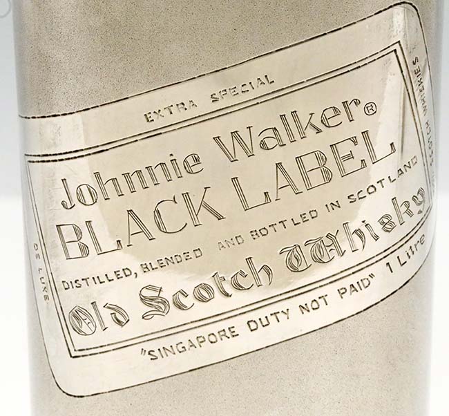 label on sterling silver trompe l'oeil Johnnie Walker bottle 