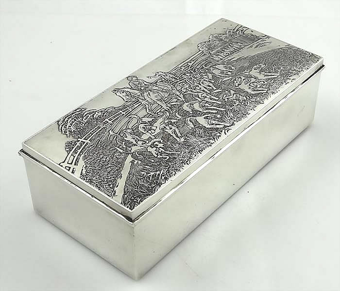 The McChesney sterling silver cigar box with horse  scenes