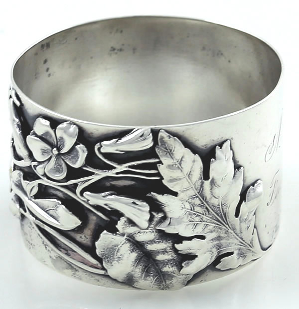 Shiebler sterling napkin ring with applied flowers and leaves