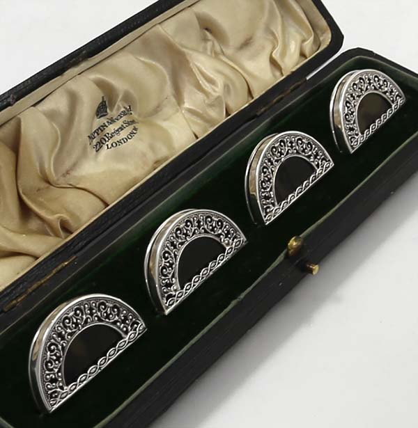 Boxed set of William Comyns sterling silver place card holders retailed by Mappin & Webb