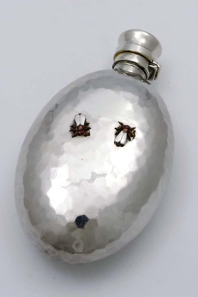 reverse of Whitging antique sterling mixed metals flask showing two applied mixed metals flies