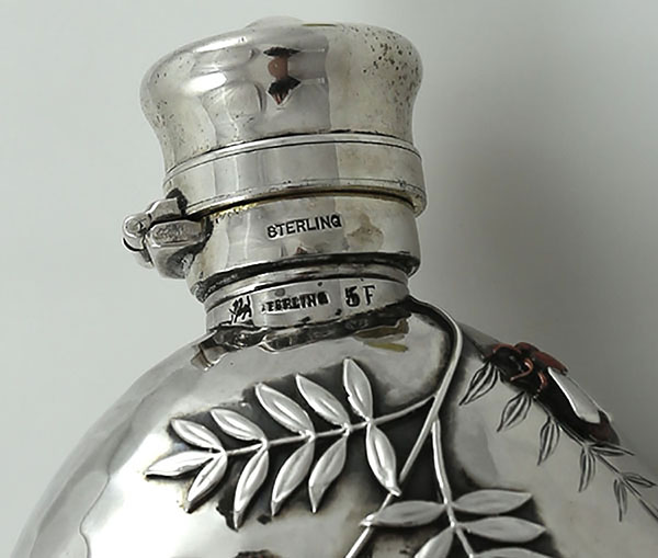 top of the front of Whiting antique sterling mixed metals flask