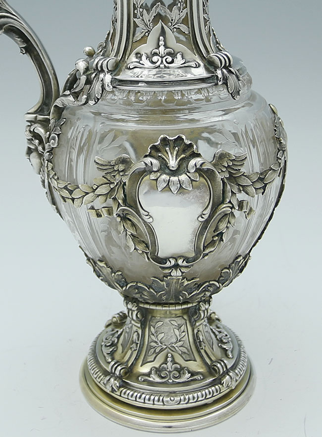 detail of fine silver mounts on French antique silver wine jug