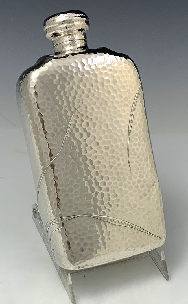 reverse of Tiffany applied hammered table flask