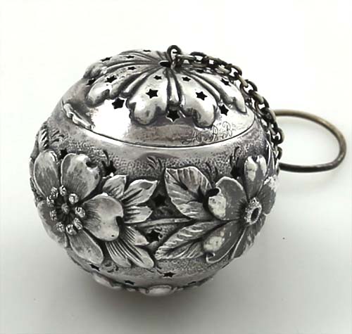 Reed & Barton antique sterling silver tea ball with chased flowers