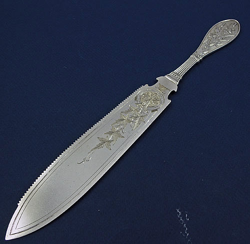 Whiting honeysuckle all sterling silver serrated cake saw